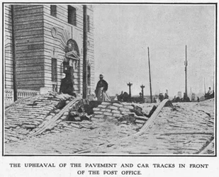 The upheaval of the pavement and car tracks in front of the Post Office, after the 1906 San Francisco earthquake, 1906